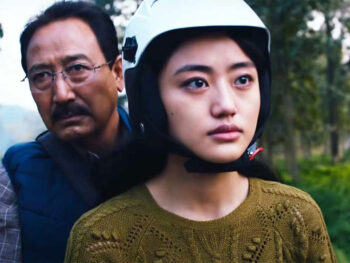 আনেক চলচ্চিত্রের আইডো (আন্দ্রেয়া কেভিচুসা) ও তার বাবা ওয়াংনাও (মিপহাম ওটসাল)